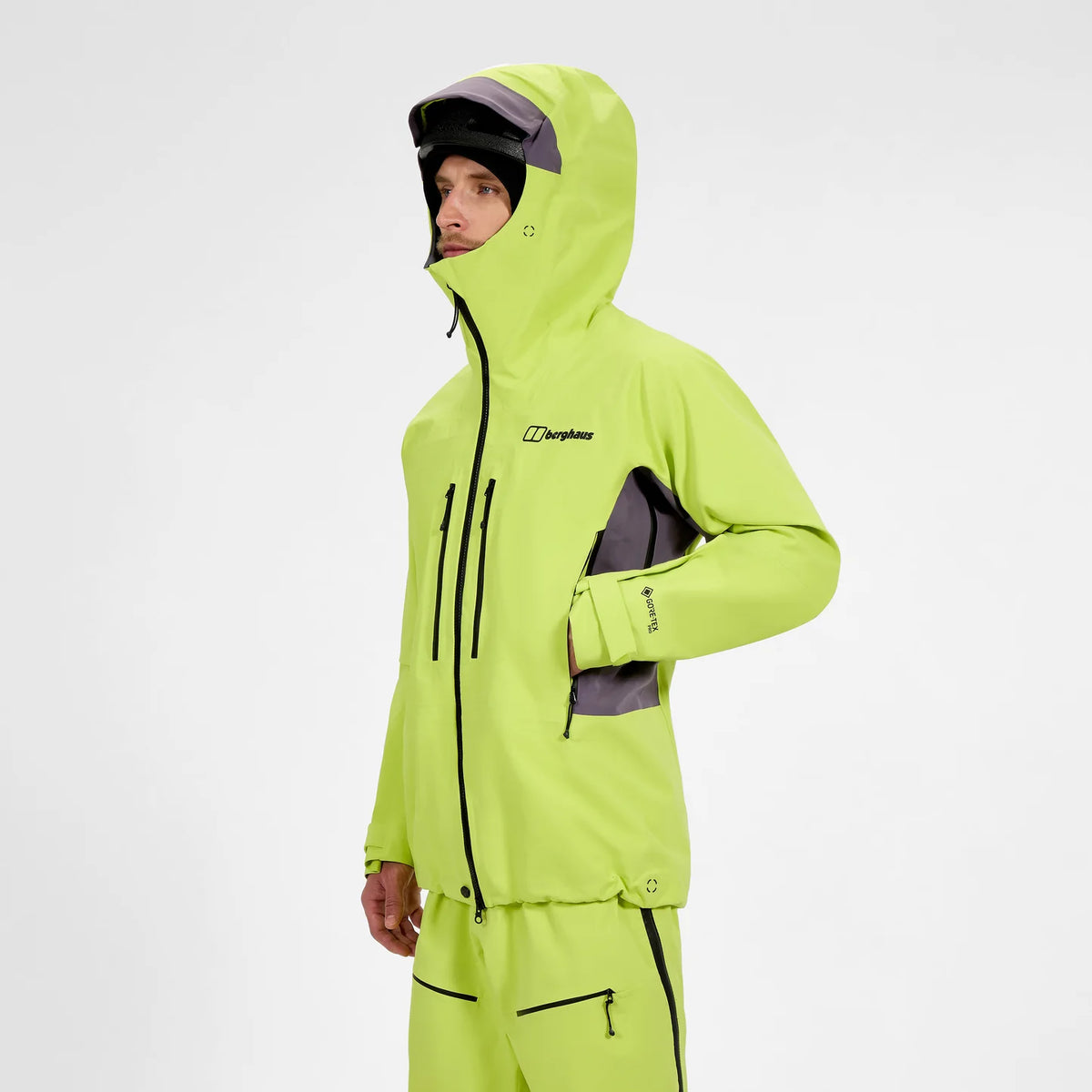 Men's neon yellow waterproof jacket side view with attached hood and zip pocket panels