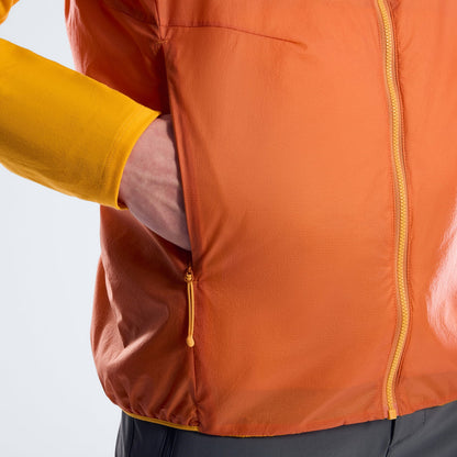Orange insulated gilet with front zip and zip pull, high collar, long armholes