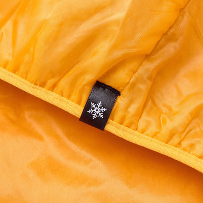 Orange gilet interior with black fabric size label and white snowflake icon on seam