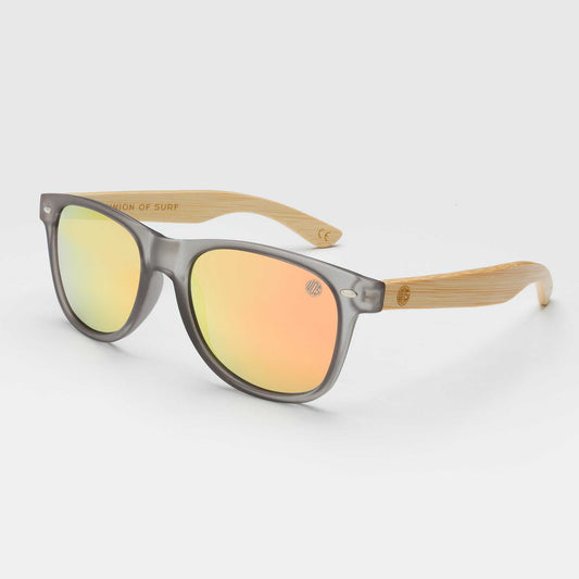 Dark gray sunglasses with orange mirrored lenses and bamboo-look arms