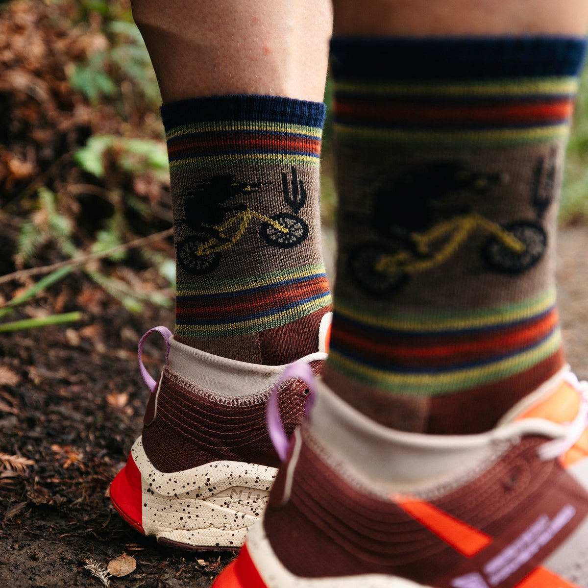 Men's micro crew hiking socks close-up, brown/navy animal print and stripes