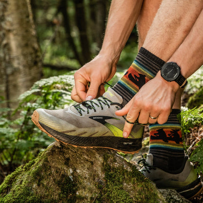 Men's micro crew hiking socks, dark charcoal with multicolor striped animal motif and ribbed cuff