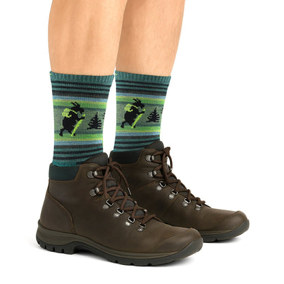 Men's micro crew hiking socks on boots, green stripes and animal graphic