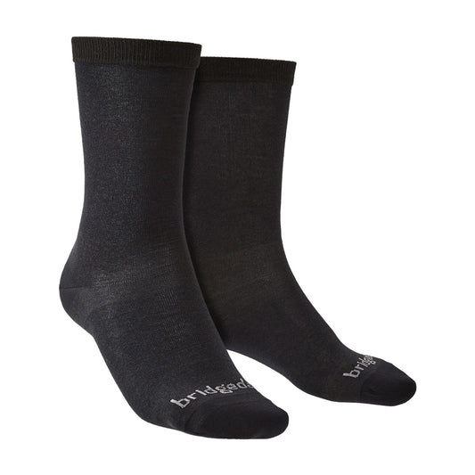 Black men's liner boot socks, ribbed cuff and Bridgedale logo on foot