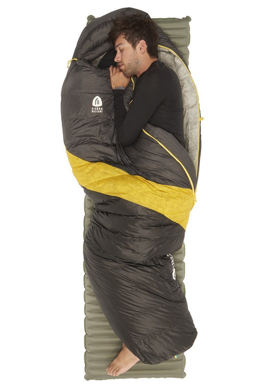Long down sleeping bag, dark exterior with yellow diagonal stripe and hood