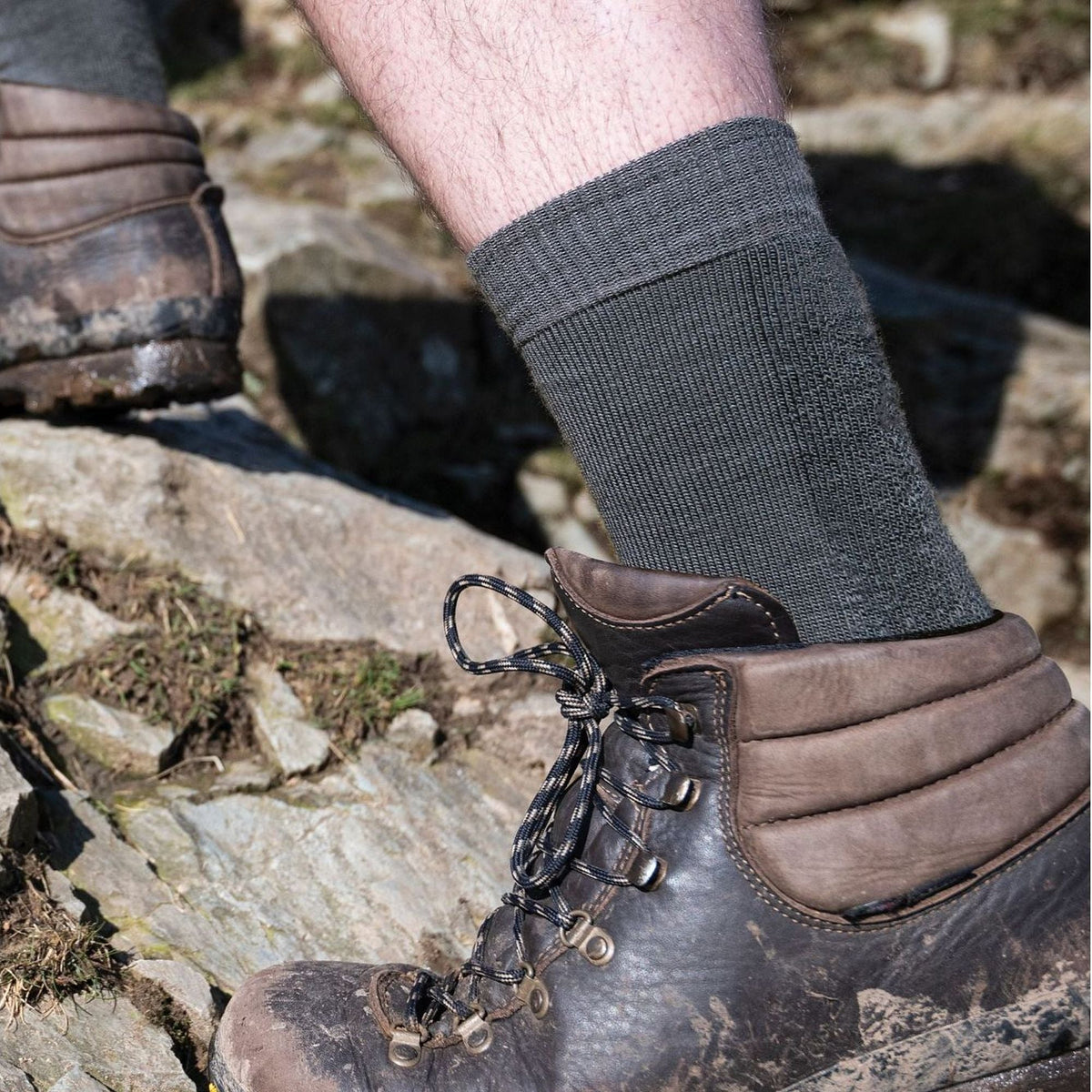 Mens hiking boot socks in medium grey, ribbed crew cuff, worn with leather shoes