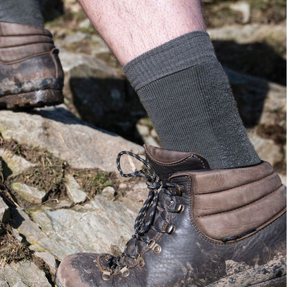 Mens hiking boot socks in medium grey, ribbed crew cuff, worn with leather shoes