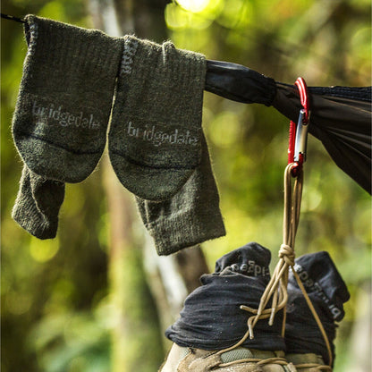 Men’s hiking boot socks, dark green-gray with subtle Bridgedale logo on cuff