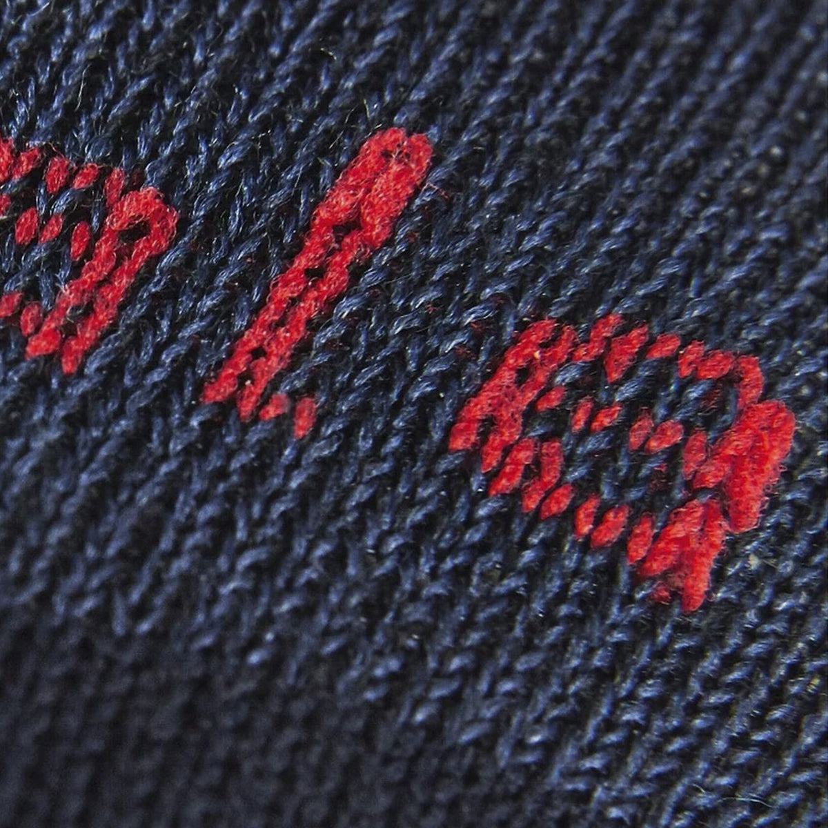 Navy sock knit with red and blue embroidered logo detail