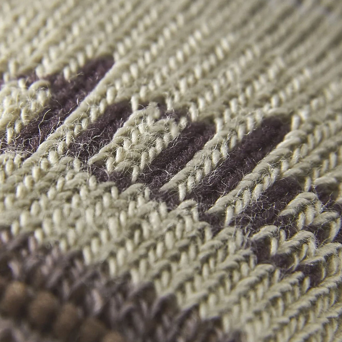 Lightweight merino hiking sock close-up, sand knit with brown logo