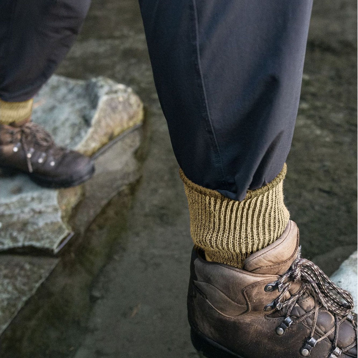 Ladies natural beige merino wool boot socks on hiking boots with ribbed cuff