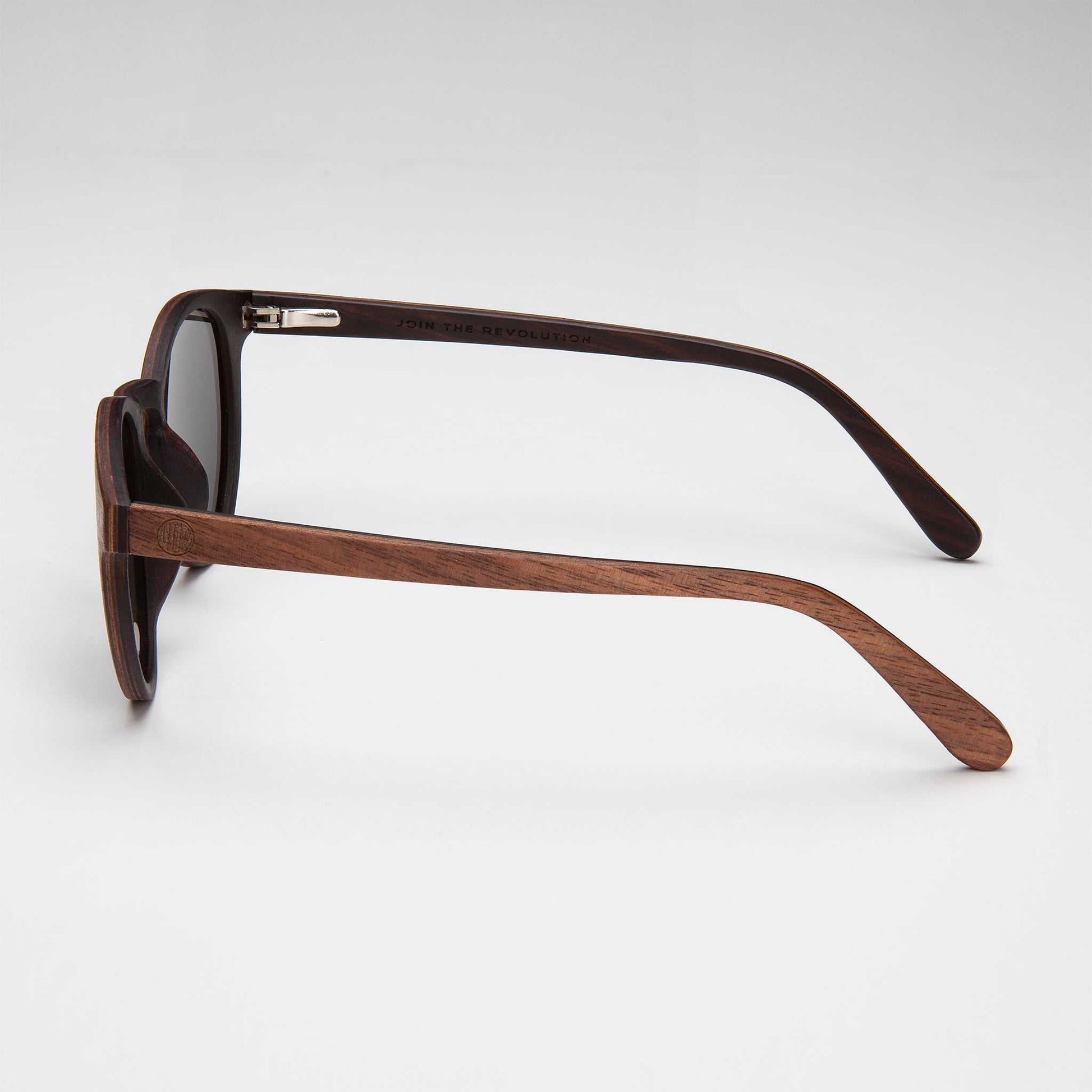 Wood-look sunglasses with mirrored lenses, metal hinge, and angled temple tips