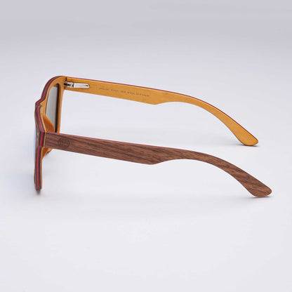 Wood-look sunglasses side view with brown frame and orange-tinted temple tips