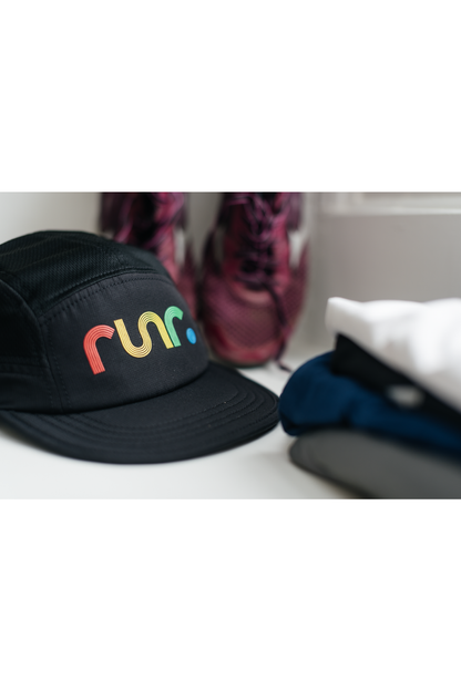 Black running cap with multicolor "run" logo, front view
