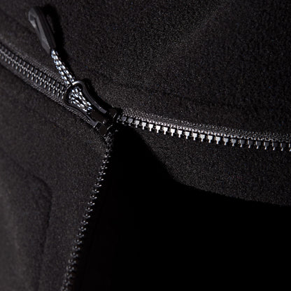 Black fleece jacket zipper with metal pull and stitched zip track