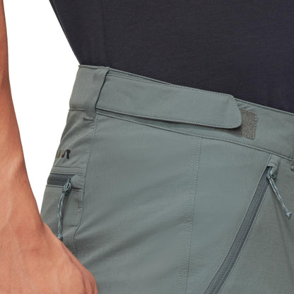 Light gray trail running shorts close-up, adjustable waist tab and zip pocket