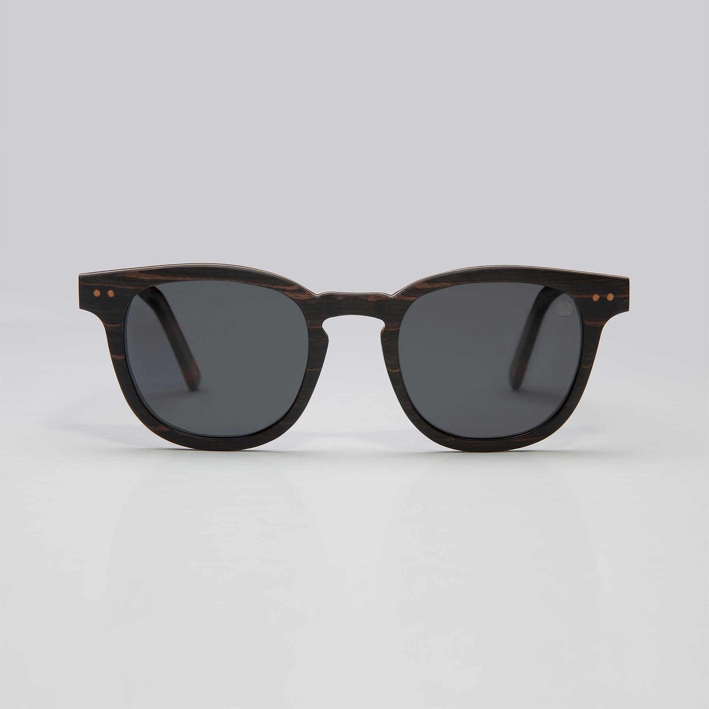 Round black sunglasses with dark lenses