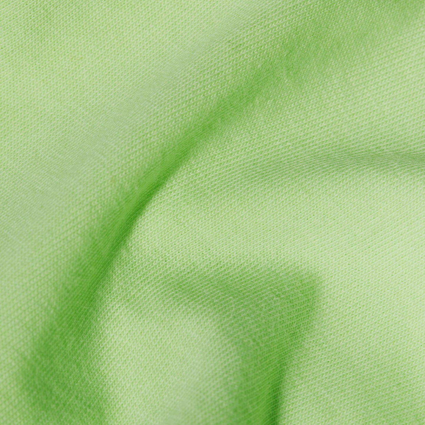 Men's short-sleeve T-shirt fabric in neon green knit close-up