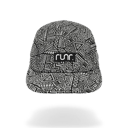 Black-and-white geometric technical running hat with centered front logo patch