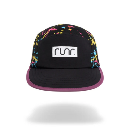 Black technical running hat with multicolor paint-splash print, purple brim, front RUNR patch.
