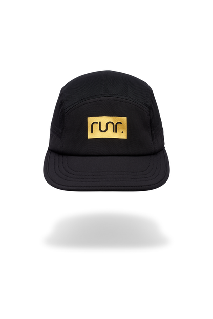 Black technical running hat with gold "run." logo patch and curved brim