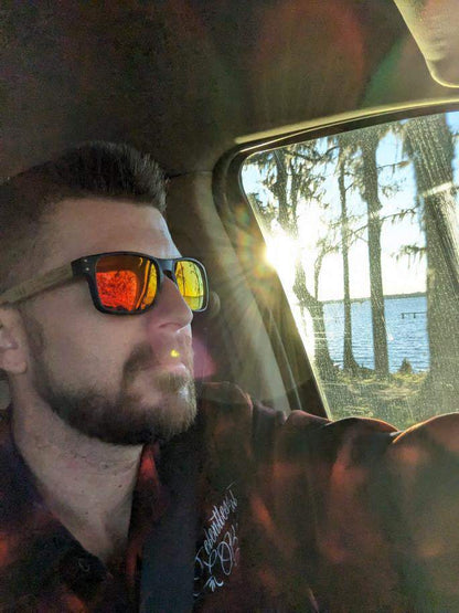 Bells Beach men's polarised sunglasses, black frame, orange mirror lenses, wood arms