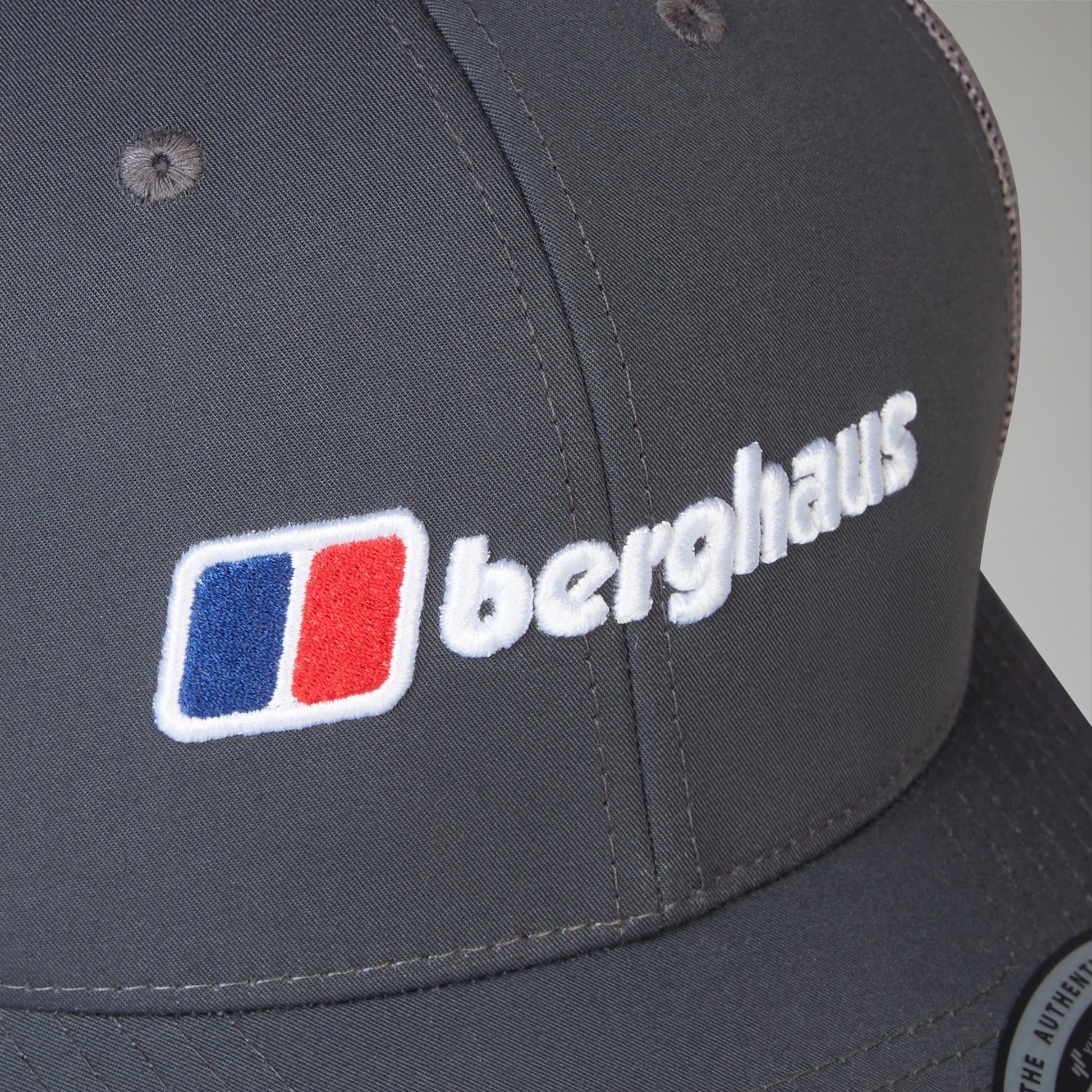 Gray cap with Berghaus logo on a gray background
