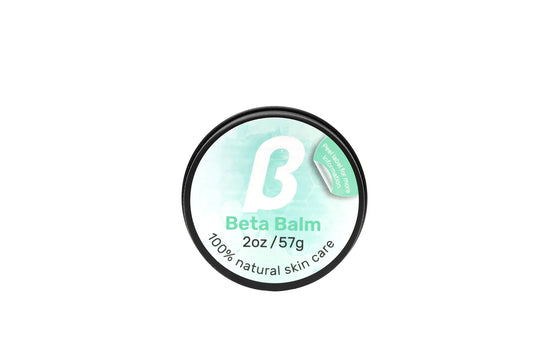Beta Balm container with branding on a white background