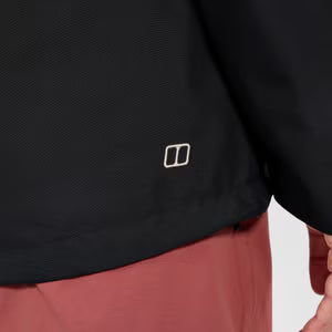 Close-up of a black jacket with a logo on a white background