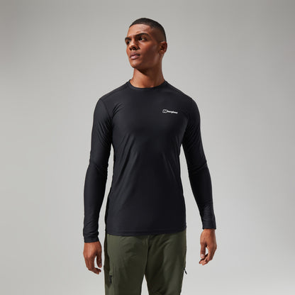 Man wearing a black long-sleeve shirt with a Berghaus logo on a gray background