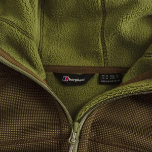 Close-up of a green fleece jacket with a Berghaus logo on the chest.