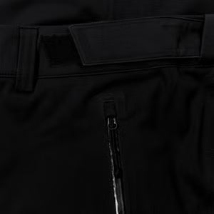Close-up of a black jacket with a zipper and belt