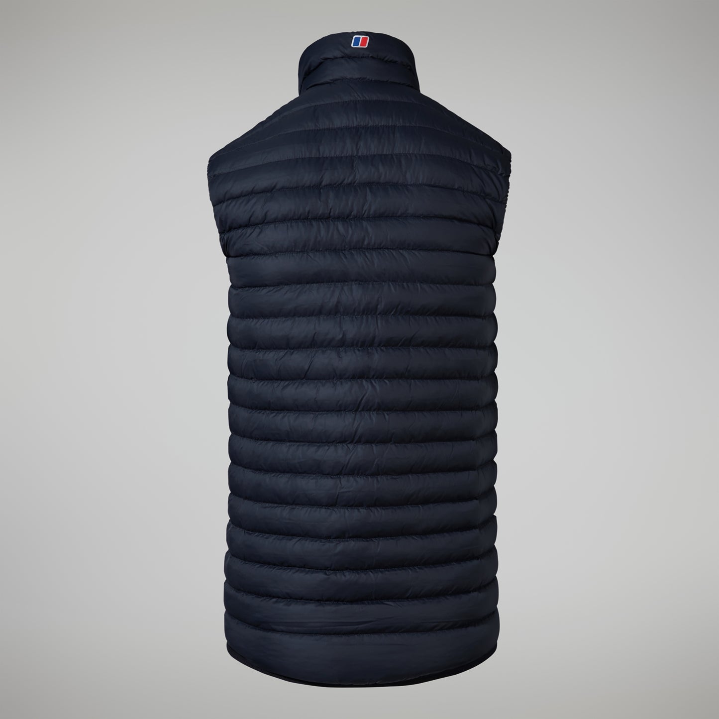 Black puffer vest on a gray background