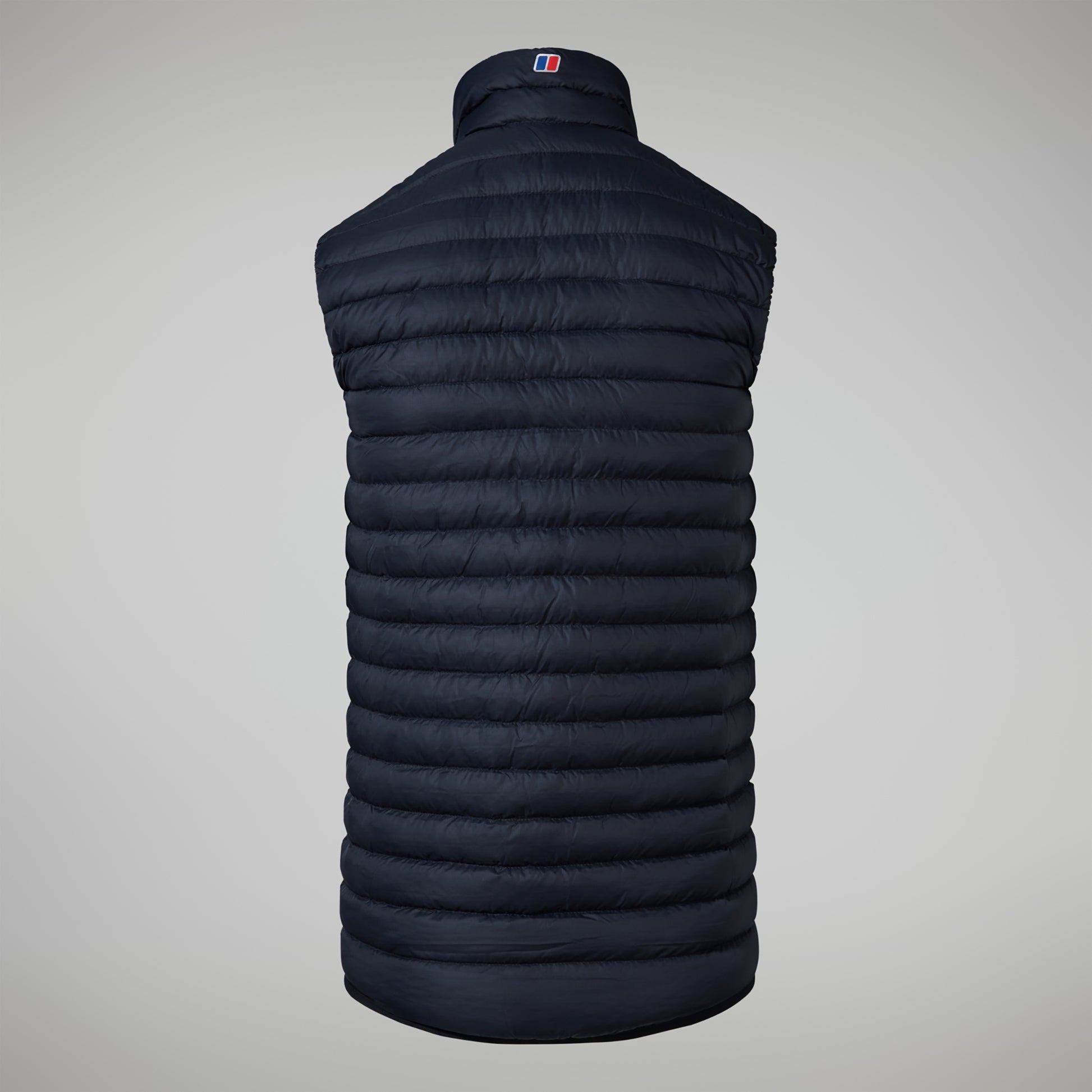 Black puffer vest on a gray background