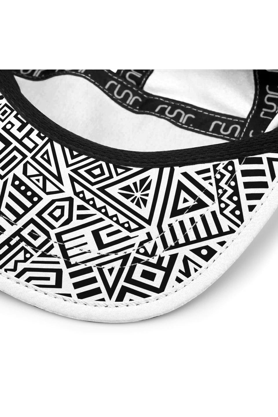 White running hat showing patterned interior panels and black-lined underside