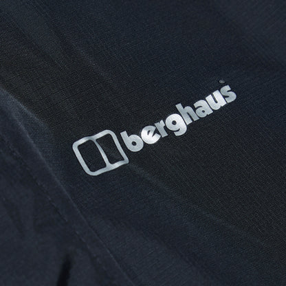 berghaus logo on dark waterproof overtrouser fabric