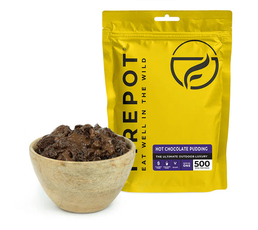 Dehydrated hot chocolate pudding pouch with a bowl of pudding