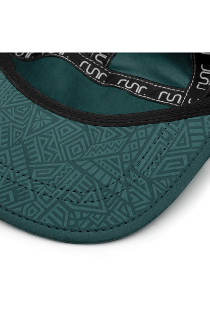 Technical running hat brim close-up with dark teal trim and patterned inner lining
