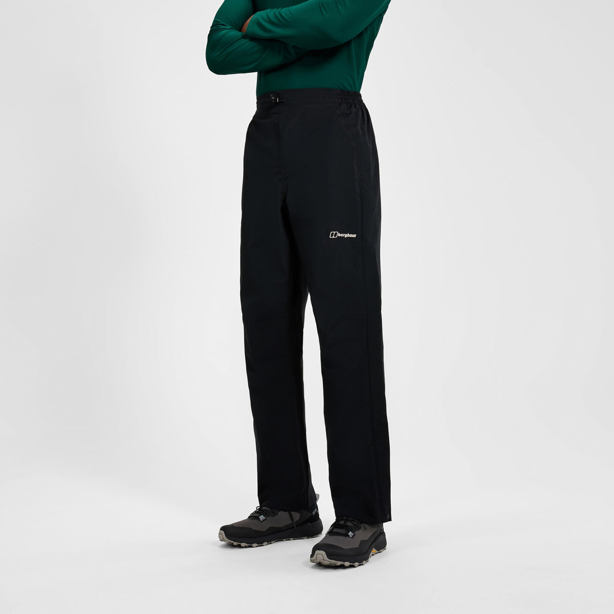 Black waterproof overtrousers with straight cut and logo on side leg
