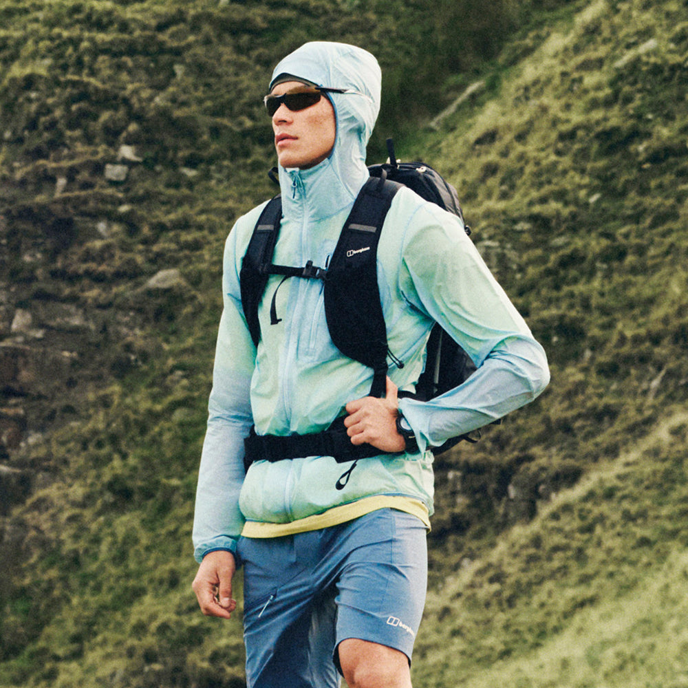 Light blue hooded rain jacket with full front zipper and long sleeves