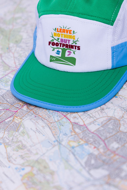 Technical running hat front logo patch with green top and blue brim edge