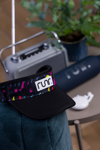 Black visor with multicolor splatter trim and front logo patch detail
