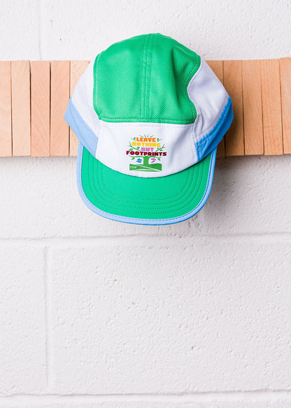 Technical running hat with green top, white front panel, and blue brim edge