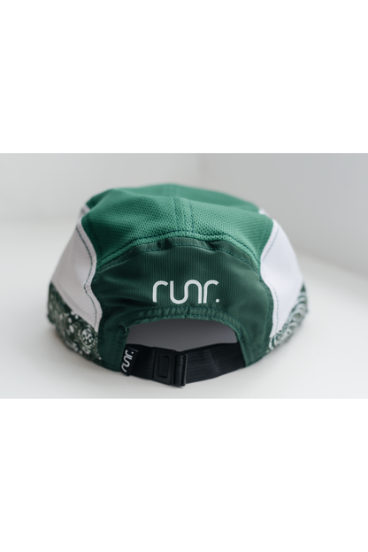 Back view of green technical running hat with black strap and RUNR logo.