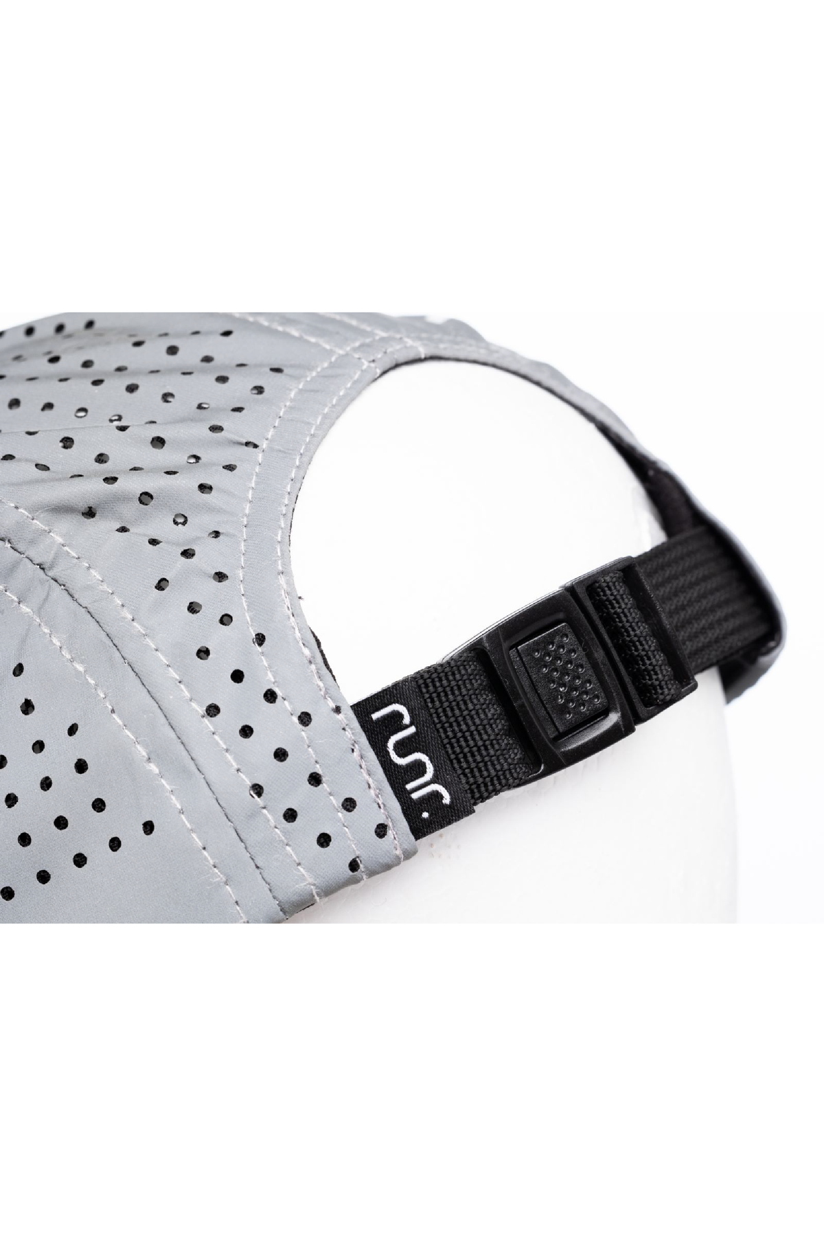Silver running hat with adjustable black strap and RUNR logo patch