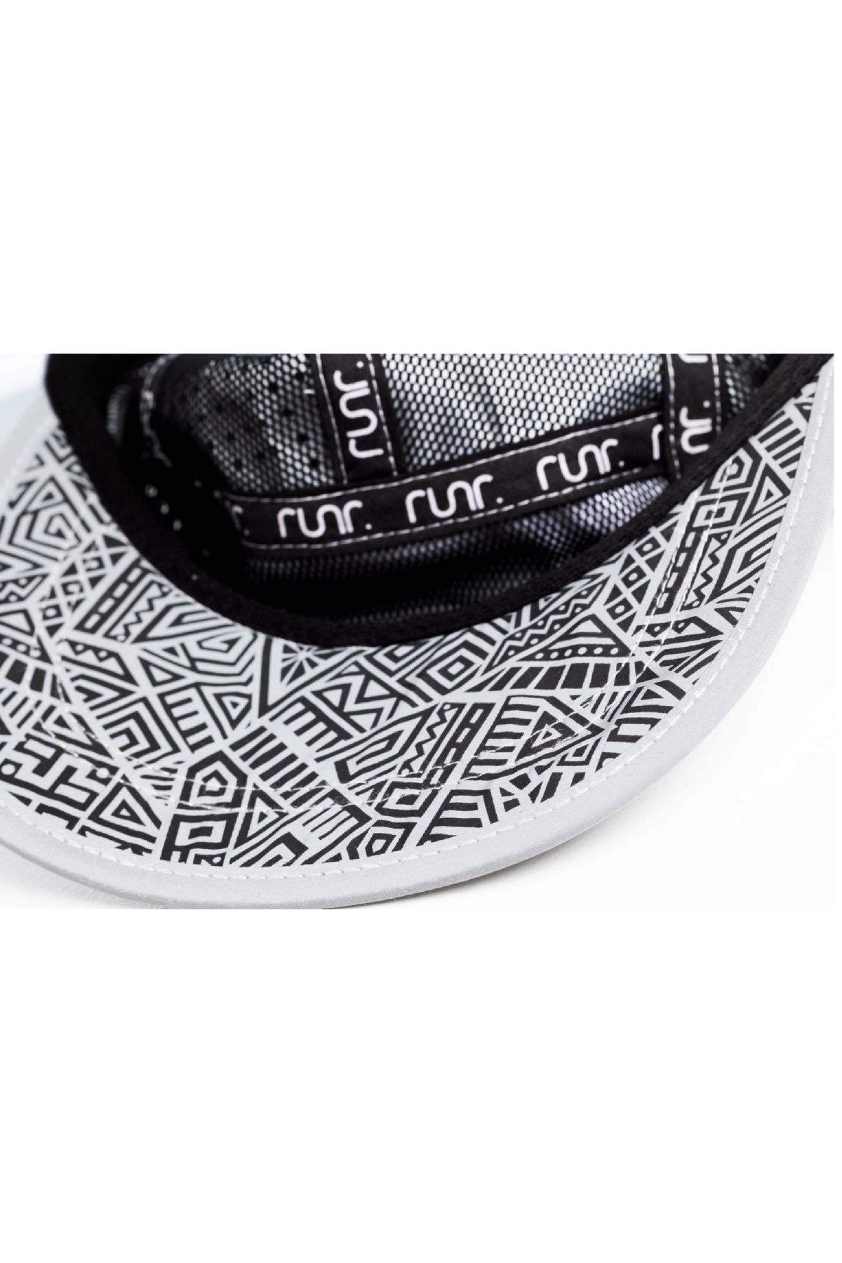 Silver running hat interior band with black-and-white patterned lining and RUNR text