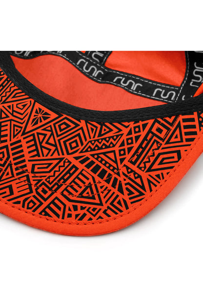 Orange cap underside with geometric inner band and patterned fabric