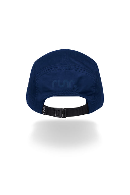 Navy running cap with adjustable black strap and plastic buckle at back
