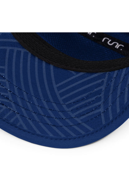 Navy running cap close-up with striped texture and black brim trim