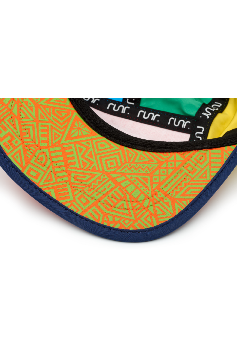 Multicolor running hat brim with geometric patterned underside and blue trim